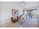 Home office with built in shelving and comfortable seating at 158 Ramon Ne Way, St Petersburg, FL 33704
