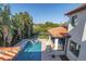 Stunning pool and spa with expansive patio and lush landscaping at 158 Ramon Ne Way, St Petersburg, FL 33704