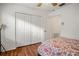 Bedroom with wood-look floors and large closet at 1613 Prowmore Dr, Brandon, FL 33511