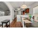 Dining room with a table, chairs, and an open view of the kitchen at 1613 Prowmore Dr, Brandon, FL 33511