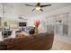 Spacious living area with leather furniture and large windows at 1613 Prowmore Dr, Brandon, FL 33511