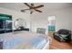 Main bedroom with a king-size bed and access to the bathroom at 1613 Prowmore Dr, Brandon, FL 33511