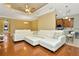Open living space with a large sectional sofa and kitchen views at 11220 Paradise Point Way, New Port Richey, FL 34654