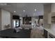 Modern dining area with sleek table and access to the backyard at 1810 W Erna Dr, Tampa, FL 33603