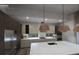 Modern kitchen with stainless steel appliances and island at 1810 W Erna Dr, Tampa, FL 33603