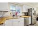 Kitchen with butcher block countertops and stainless steel appliances at 3407 King George Ln, Seffner, FL 33584