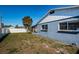 Backyard view of home, showing side and fence at 4051 30Th N Ave, St Petersburg, FL 33713