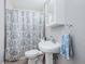 Simple bathroom with shower and pedestal sink at 4051 30Th N Ave, St Petersburg, FL 33713
