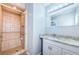 Bathroom features a shower and granite countertop vanity at 4051 30Th N Ave, St Petersburg, FL 33713