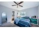 Bedroom with a queen bed, ceiling fan, and mirrored closet at 4051 30Th N Ave, St Petersburg, FL 33713