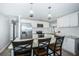 Modern kitchen with stainless steel appliances, granite countertops, and white cabinets at 4051 30Th N Ave, St Petersburg, FL 33713
