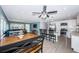 Open floor plan with kitchen, dining area, and living room at 4051 30Th N Ave, St Petersburg, FL 33713