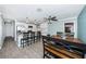 Open concept kitchen and dining area with breakfast bar and wooden table at 4051 30Th N Ave, St Petersburg, FL 33713