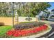 Savannah Landings community entrance sign surrounded by lush landscaping and colorful foliage at 1105 Savannah Landings Ave, Valrico, FL 33596