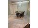 Cozy dining area with tile floor and neutral paint, next to back and side door at 1105 Savannah Landings Ave, Valrico, FL 33596