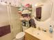 Bathroom with shower/tub combo, toilet, and vanity with sink at 24862 Us Highway 19 N # 3001, Clearwater, FL 33763