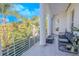 Private balcony with fire pit and lush tropical views at 2711 W Trilby Ave, Tampa, FL 33611