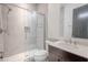 Clean bathroom with walk-in shower and modern vanity at 2711 W Trilby Ave, Tampa, FL 33611