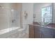 Modern bathroom with glass bowl sink and shower at 2711 W Trilby Ave, Tampa, FL 33611