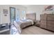 Bright bedroom with private door to balcony at 2711 W Trilby Ave, Tampa, FL 33611