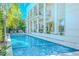 Resort-style pool with home view at 2711 W Trilby Ave, Tampa, FL 33611