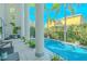 Relaxing pool and patio area with lush landscaping at 2711 W Trilby Ave, Tampa, FL 33611