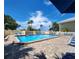 Inviting community swimming pool with lounge chairs at 611 Destiny Dr # 207, Ruskin, FL 33570