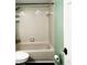 Clean bathroom with beige tile and a shower/tub combo at 9107 Lingrove Rd, Weeki Wachee, FL 34613