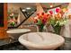 Stylish bathroom featuring a unique vessel sink and granite vanity at 1390 Gulf Blvd # Ph-1, Clearwater Beach, FL 33767