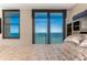 Bedroom with ocean view and king-size bed at 1390 Gulf Blvd # Ph-1, Clearwater Beach, FL 33767