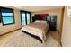 Spacious bedroom with ocean view and king-size bed at 1390 Gulf Blvd # Ph-1, Clearwater Beach, FL 33767