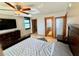 Spacious bedroom with a king-size bed and ensuite bathroom at 1390 Gulf Blvd # Ph-1, Clearwater Beach, FL 33767