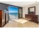 Bedroom with ocean view and dresser at 1390 Gulf Blvd # Ph-1, Clearwater Beach, FL 33767