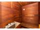 Private sauna with wood paneling and built-in bench at 1390 Gulf Blvd # Ph-1, Clearwater Beach, FL 33767