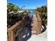 Enjoy easy beach access via a private wooden walkway leading to the sandy shores and the beautiful ocean at 1540 Gulf Blvd # 2107, Clearwater Beach, FL 33767