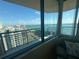 Stunning panoramic view of the bay and cityscape from the spacious balcony through floor to ceiling windows at 1540 Gulf Blvd # 2107, Clearwater Beach, FL 33767