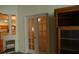 French doors open to an adjacent room, offering natural light at 19409 Weymouth Dr, Land O Lakes, FL 34638