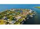 Aerial view of waterfront home and neighborhood at 152 Carlyle Dr, Palm Harbor, FL 34683