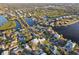 Aerial view of neighborhood, highlighting waterfront property location at 152 Carlyle Dr, Palm Harbor, FL 34683