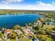 Aerial view showcasing the home's waterfront location and neighborhood at 152 Carlyle Dr, Palm Harbor, FL 34683