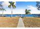 Private walkway leading to a waterfront dock at 152 Carlyle Dr, Palm Harbor, FL 34683