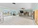 Bright living room with water access and a view at 152 Carlyle Dr, Palm Harbor, FL 34683