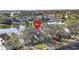 Aerial view showcasing condo's waterfront location in a quiet community at 155 Nina Way, Oldsmar, FL 34677