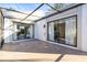 Screened patio with double sliding glass doors and view of backyard at 155 Nina Way, Oldsmar, FL 34677