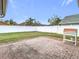 Private backyard with a brick patio and a large grassy area at 18518 Avocet Dr, Lutz, FL 33558