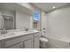 Clean bathroom with double vanity, tub, and shower at 3457 Timber Crossing Ave, Brandon, FL 33511