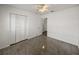 Bedroom with closet, ceiling fan and access to another room at 4608 S Shamrock Rd, Tampa, FL 33611