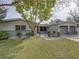 Single story home with a two-car garage and well-maintained lawn at 4608 S Shamrock Rd, Tampa, FL 33611