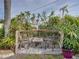 Wooden patio seating area with table and chairs at 4608 S Shamrock Rd, Tampa, FL 33611