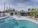 Inviting kidney-shaped pool with ample deck space at 4608 S Shamrock Rd, Tampa, FL 33611